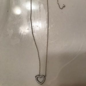 Pandora reversible heart silver necklace.